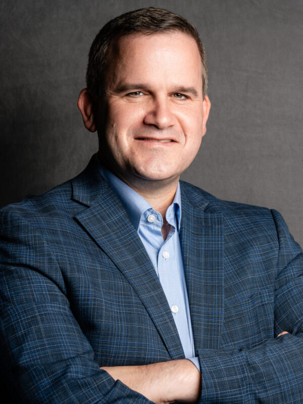 John-Henry-Crosby-Headshot-scaled-e1744061474619-600x800